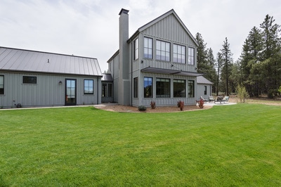 Large lawn installation in Bend at Custom home in Bend Oregon built on private acreage in modern farmhouse style by Structure Development NW a home builder in Central Oregon.