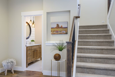 Interior entry foyer and stairs in Custom home in Bend, Oregon Northwest Crossing built by Structure Development NW an award winning homebuilder in Central Oregon. Farmhouse Style home with stunning interior design.